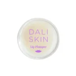 Dali Skin Lip Plumper container featuring a 100% natural cinnamon formula designed to gently plump and hydrate lips with a slight tingling sensation